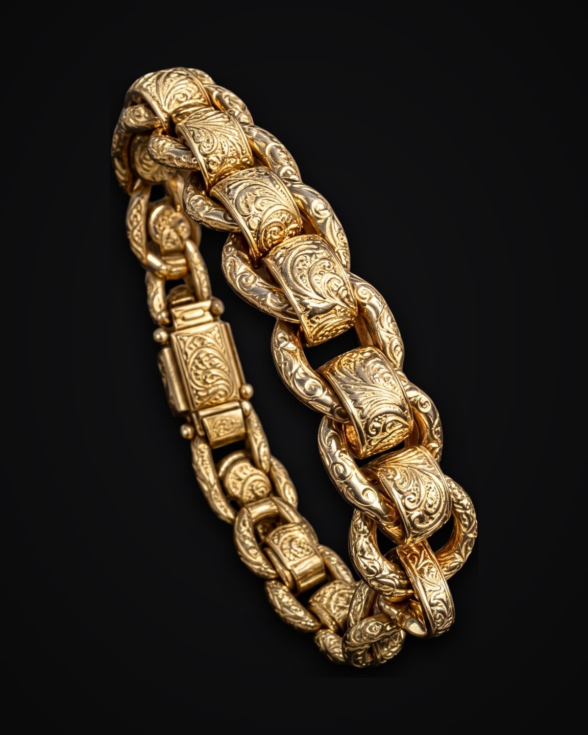 Heavy gold bracelet of engraved links