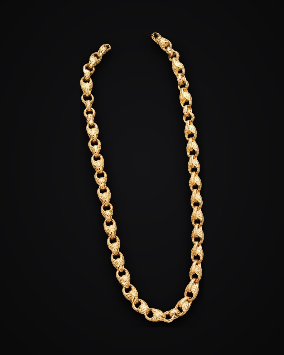 Gold belcher chain, shown on a black background