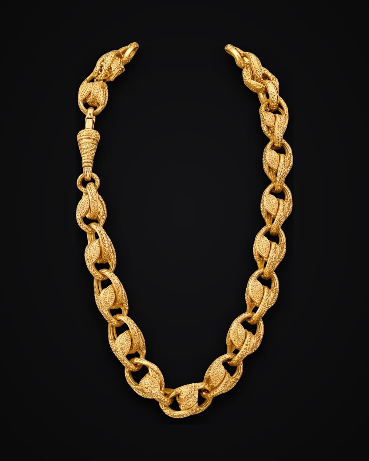 Gold chain of engraved barrel links