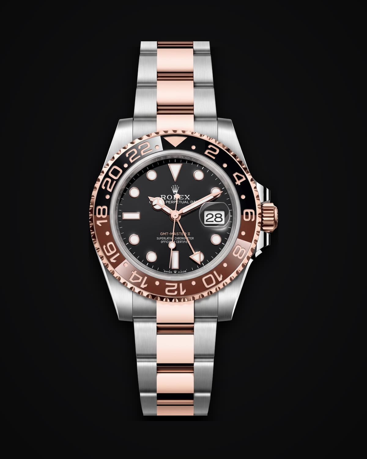 Steel watch with a black dial and a two-tone brown and black bezel