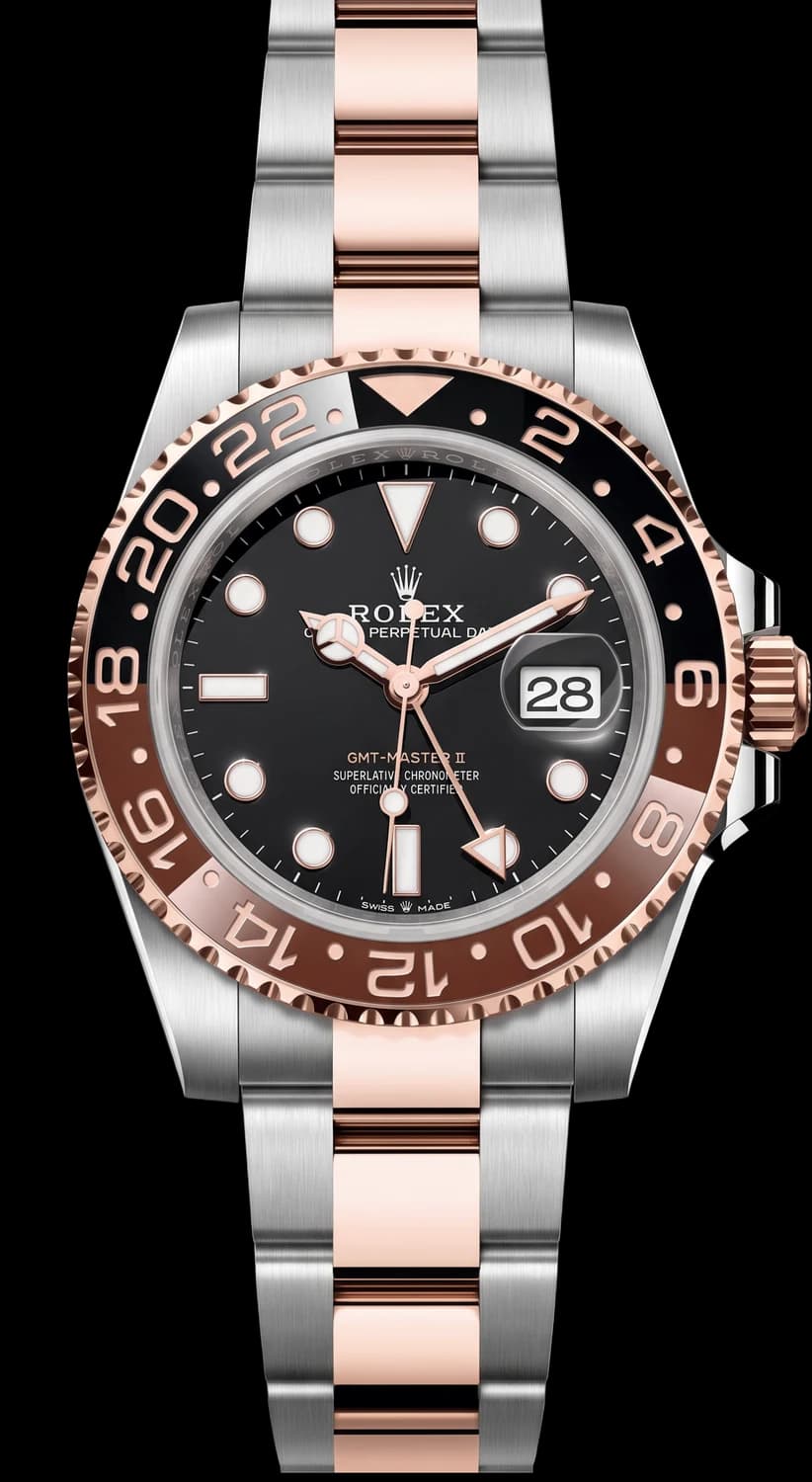 Steel watch with a black dial and a two-tone brown and black bezel
