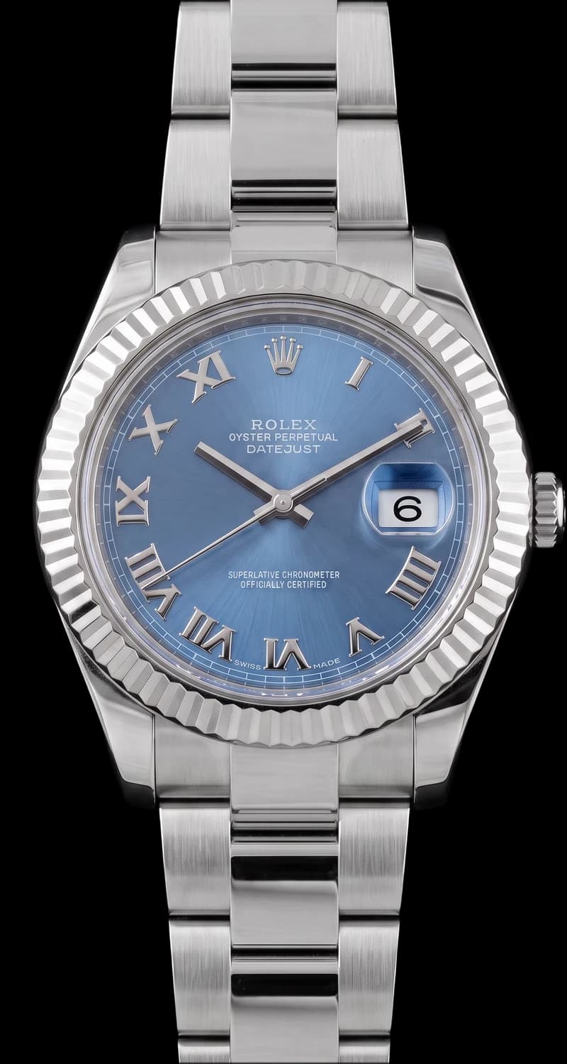 Steel watch with a blue dial and fluted bezel on a steel bracelet