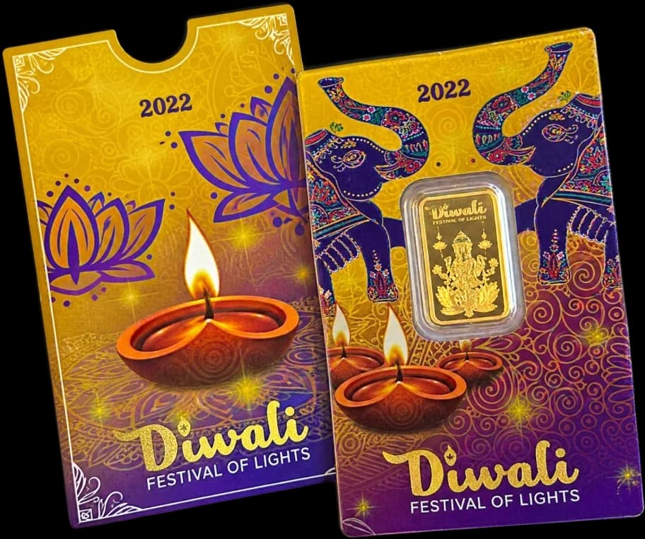 Two Diwali collector cards, each with a sealed gold bar