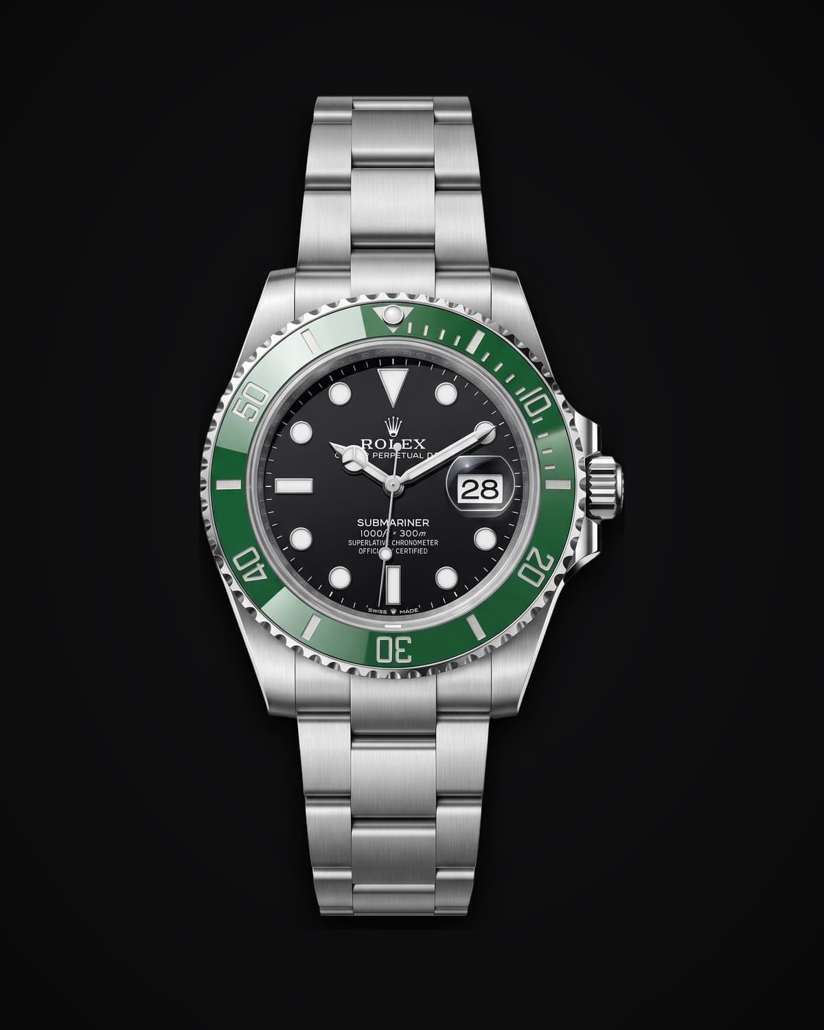 Steel dive watch with a black dial and green bezel