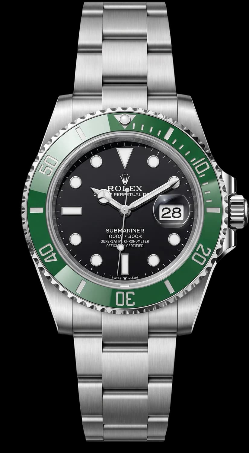 Steel dive watch with a black dial and green bezel