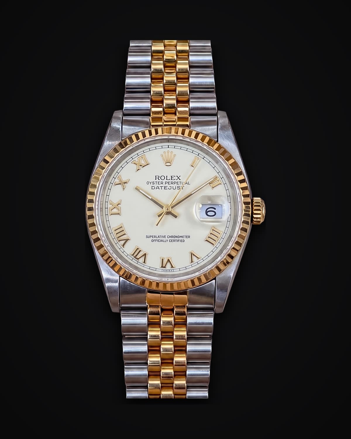 Steel and yellow gold watch with an ivory dial, gold Roman numerals and a Jubilee bracelet