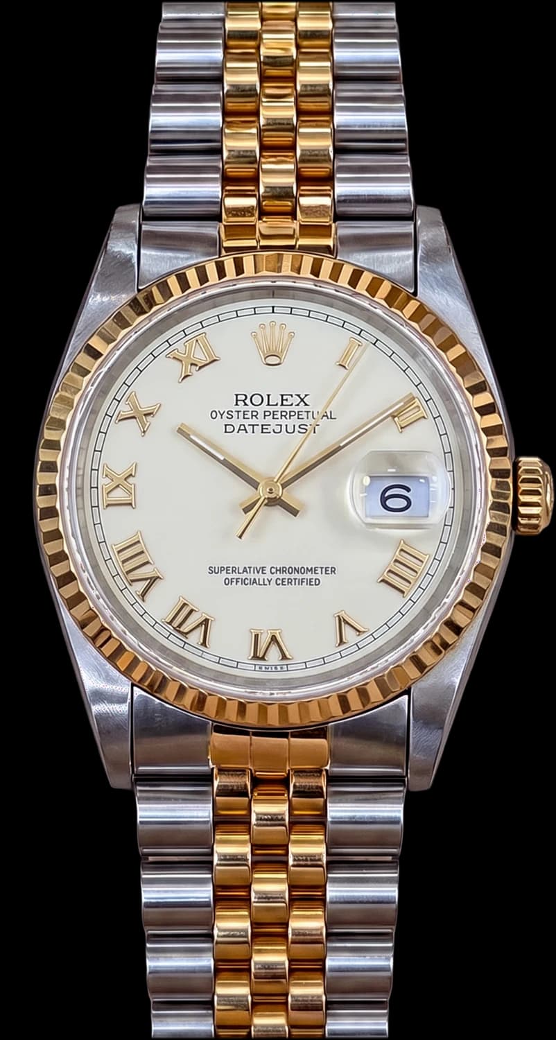 Steel and yellow gold watch with an ivory dial, gold Roman numerals and a Jubilee bracelet
